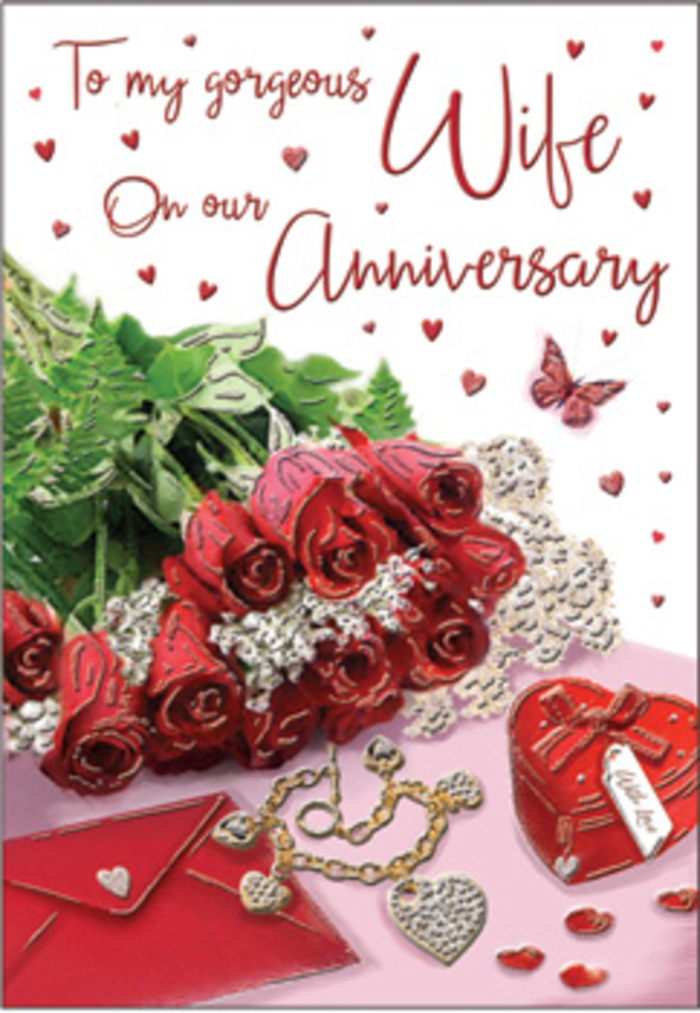 In this evocative anniversary image, a lavish cluster of red roses takes centre stage, their petals layered in plush, velvety folds that radiate romance. The bouquet is compact yet full, with each bloom turned slightly differently, giving the sense of a living, breathing arrangement freshly gathered from a local Wapping florist's workbench. Lush greenery threads between the roses, providing a cool, verdant frame that softens the intensity of the crimson tones. Beside the flowers, an elegant anniversary card and its matching envelope rest on a lightly shimmering surface, their soft ivory and blush shades echoing the gentle glow of early afternoon light that might fall through a window overlooking the Thames. A heart-shaped keepsake box sits nearby, deep red and glossy, accompanied by a piece of fine jewellery that curls delicately like a golden ribbon. The surface is scattered with tiny heart motifs that seem to drift across the scene, accompanied by a single butterfly whose wings are poised as if just about to lift. The lighting is calm and caressing, picking up subtle reflections on the metal and glass elements, while allowing the roses to remain the undeniable focus. You can almost imagine the scent of the blooms mingling with the faint papery rustle of the card as it's opened in a quiet Wapping café or home. The entire composition feels like a carefully composed love note brought to life: intimate, thoughtful, and ideal for celebrating an anniversary that has grown richer with every shared year.