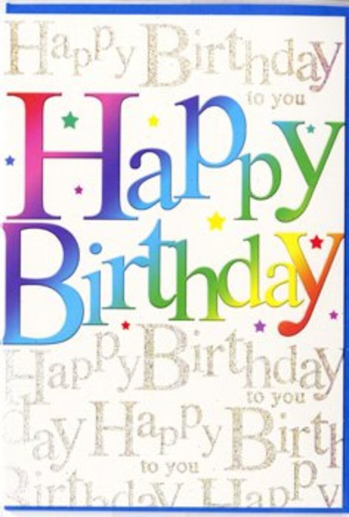The image features an exuberant birthday card propped up so that its entire front design is clearly visible, radiating the same cheerful energy you might feel walking past Wapping's riverside homes decorated for a celebration. In the centre, the message Happy Birthday is written in large, confident letters that stretch almost from edge to edge, each character filled with a rich gradient of colour. One letter may start in deep raspberry and softly transition into plum, while the next flows from cobalt blue into turquoise, then into lively green and warm golden tones. This smooth blending gives the impression of watercolour washes layered carefully by hand, evoking the artistry of a florist at Flowers Wapping blending blooms in complementary shades for a special birthday delivery. Surrounding the bold main text, tiny colourful accents-small dots, starbursts, and flecks of bright pink, yellow, blue, and green-dance across the card like confetti caught mid-air at a birthday gathering in a cosy Wapping townhouse. Beneath and behind these joyful elements, the background is coated in fine, looping golden script, repeating Happy Birthday to you in a delicate, almost whispering pattern. The gold lettering appears subtly metallic, catching light in soft glimmers rather than bold sparkles, suggesting an understated elegance. The card's surface has a smooth, lightly glossy finish, with crisp, clean edges and a sturdy feel, hinting at quality craftsmanship. Together, the rainbow letters, golden script, and confetti-like details create a design that feels both festive and thoughtful-a perfect companion to a colourful bouquet delivered across Wapping for someone whose birthday you truly want to celebrate in style.