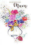 This Mother's Day card portrays a joyful, watercolour bouquet that looks as though it has been captured at the very moment of being placed in a vase, like a freshly arranged gift ready for delivery around Wapping. The central flowers are painted in saturated cerise, fuchsia, and rosy magenta, their petals formed by loose, rounded brushstrokes that give an impression of fullness and soft texture rather than precise detail. Deep indigo lines weave through and around the blooms, hinting at stems and leaves while providing a strong contrast that makes the brighter colours sing, much like vivid blossoms against the brick facades along Wapping High Street. Softer notes of lavender, powder blue, and a whisper of peach are layered in between, creating the sense of a mixed bouquet where every shade has been thoughtfully chosen. Delicate accents of gold trace some petal edges and scatter in tiny dots, adding a subtle sparkle reminiscent of evening light reflecting off the Thames. The flowers rise from a simplified vase shape near the bottom of the card, gently curved and finished with a refined golden bow that recalls the careful hand of a florist tying ribbon around a hand-tied bunch. Around the outer edges, paint splashes and small heart motifs float like tossed petals or confetti, infusing the design with movement and celebration. The overall impression is one of warmth, gratitude, and lovingly crafted artistry, perfectly suited to expressing appreciation for a mum whose presence brings colour and comfort every day.